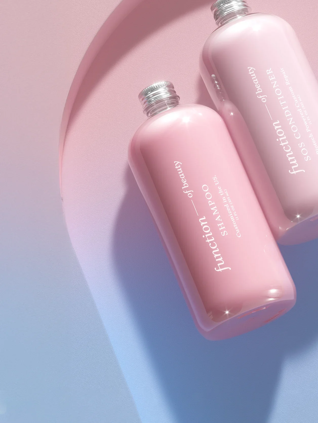 Two pink bottles against a pink and blue arch