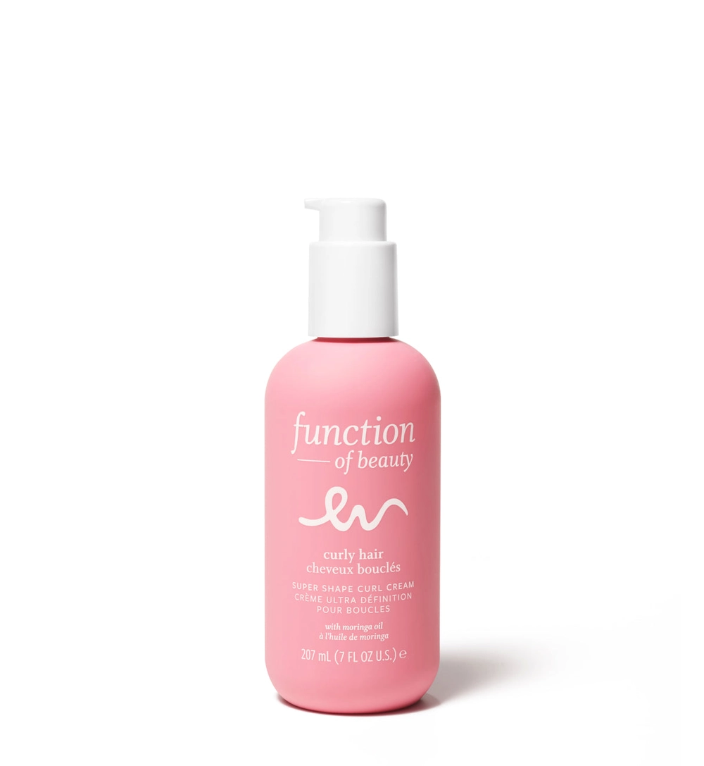 Pink bottle of super shape curl cream
